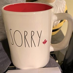 Rae dunn sorry mug with red leaf on outside